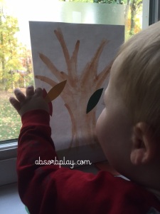 Even babies can do shape art projects easily with sticky contact paper!
